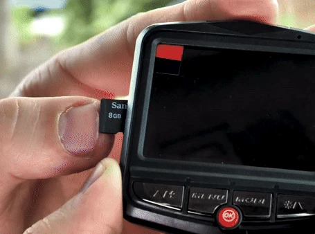 Driver installing the Vital Dash Cam in their vehicle with easy installation steps